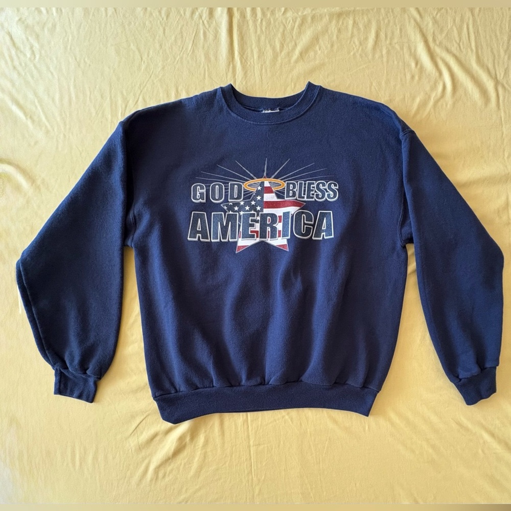 Woman’s Blue “God Bless America” Flag Graphic Crewneck Sweatshirt. L (Used)
